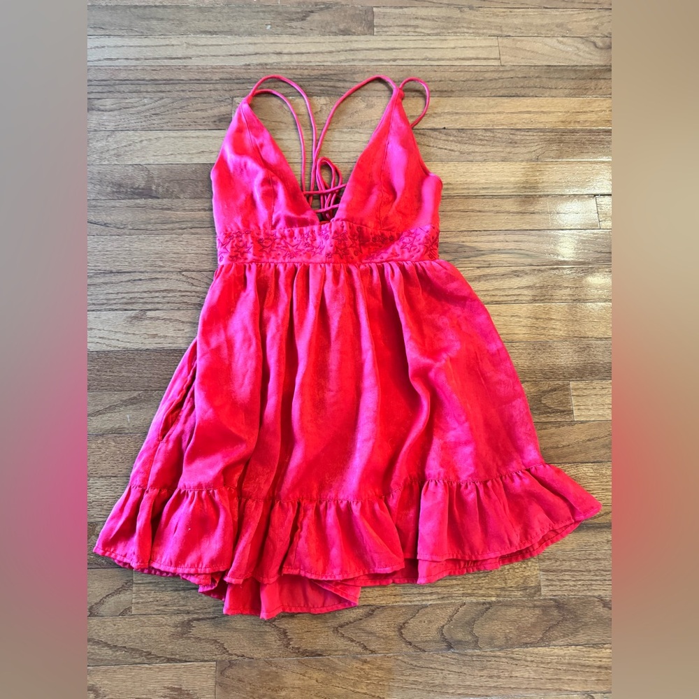 Urban Outfitters Red Mini Dress with Ruffle Hem, Pockets, and cute Star Detail
